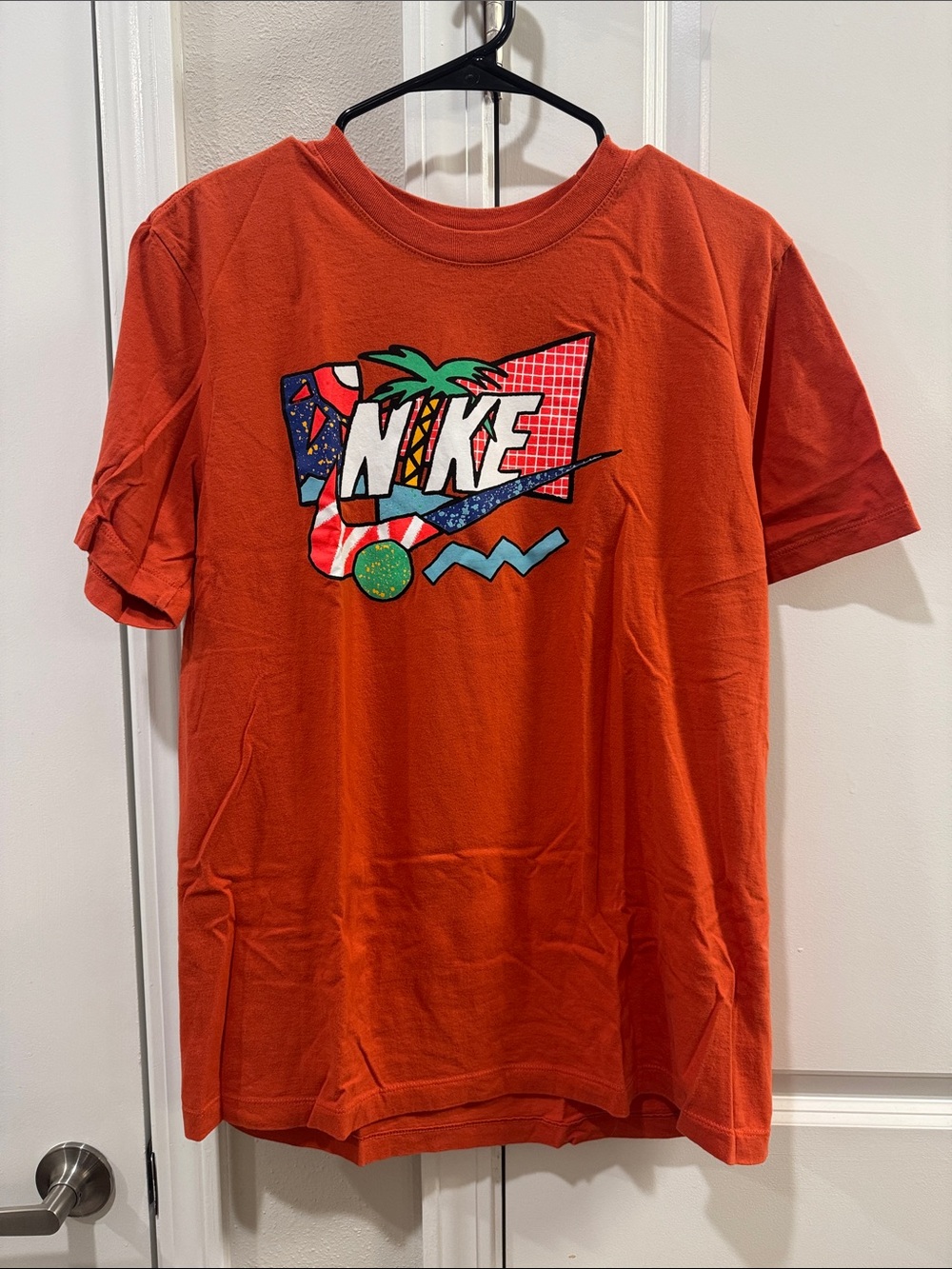Nike Orange Tee with Retro Graphic